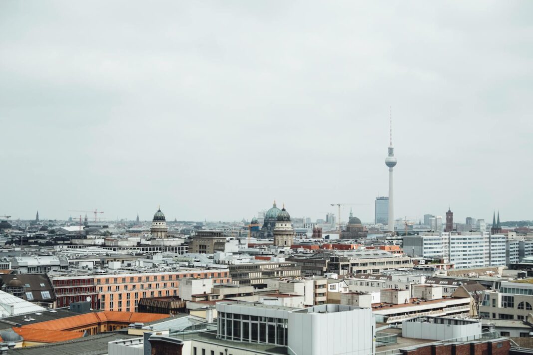 Stunning aerial view of Berlin cityscape featuring the iconic Fernsehturm tower.